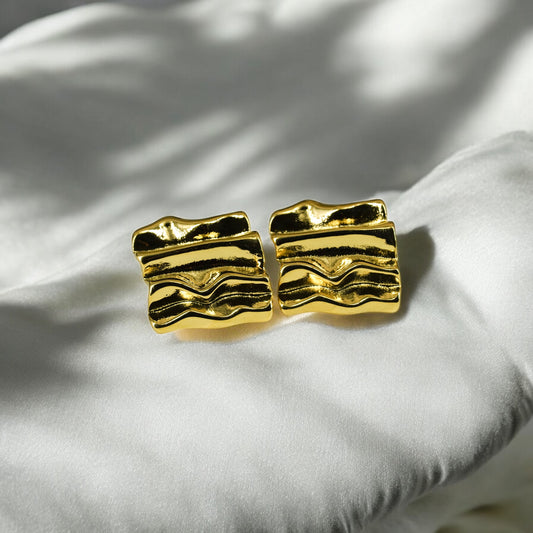 Aretes May